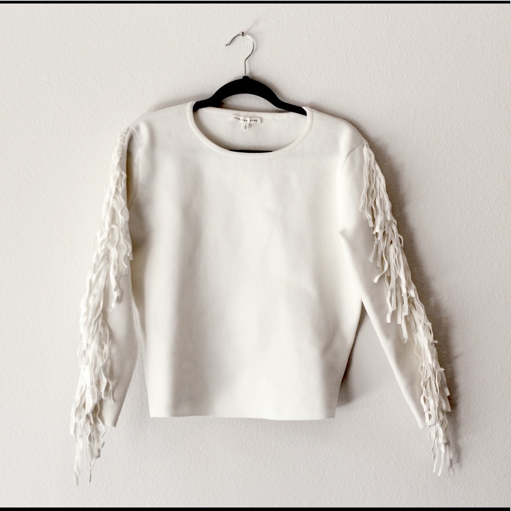 White sweater with fringe sleeves